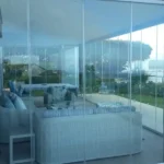 Frameless Stacking Glass Door Installation by Stack Glass & Aluminium (SGA)